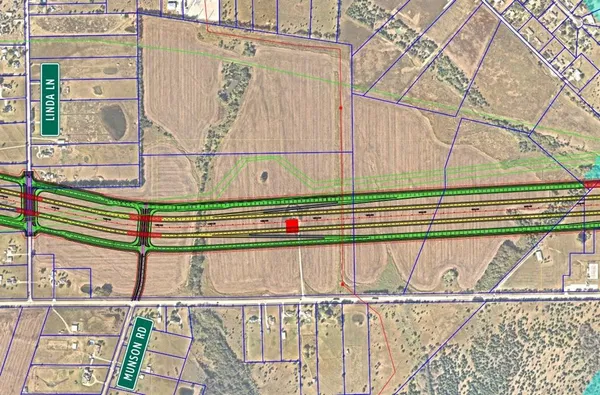 a view of a balcony with wooden floor and fence