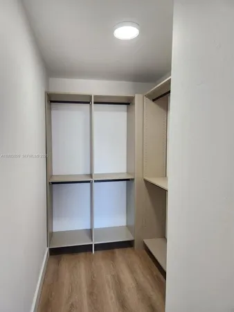 a view of a livingroom with wooden floor