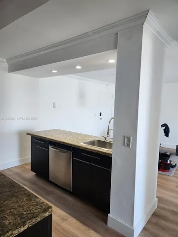 a bathroom with a toilet and shower