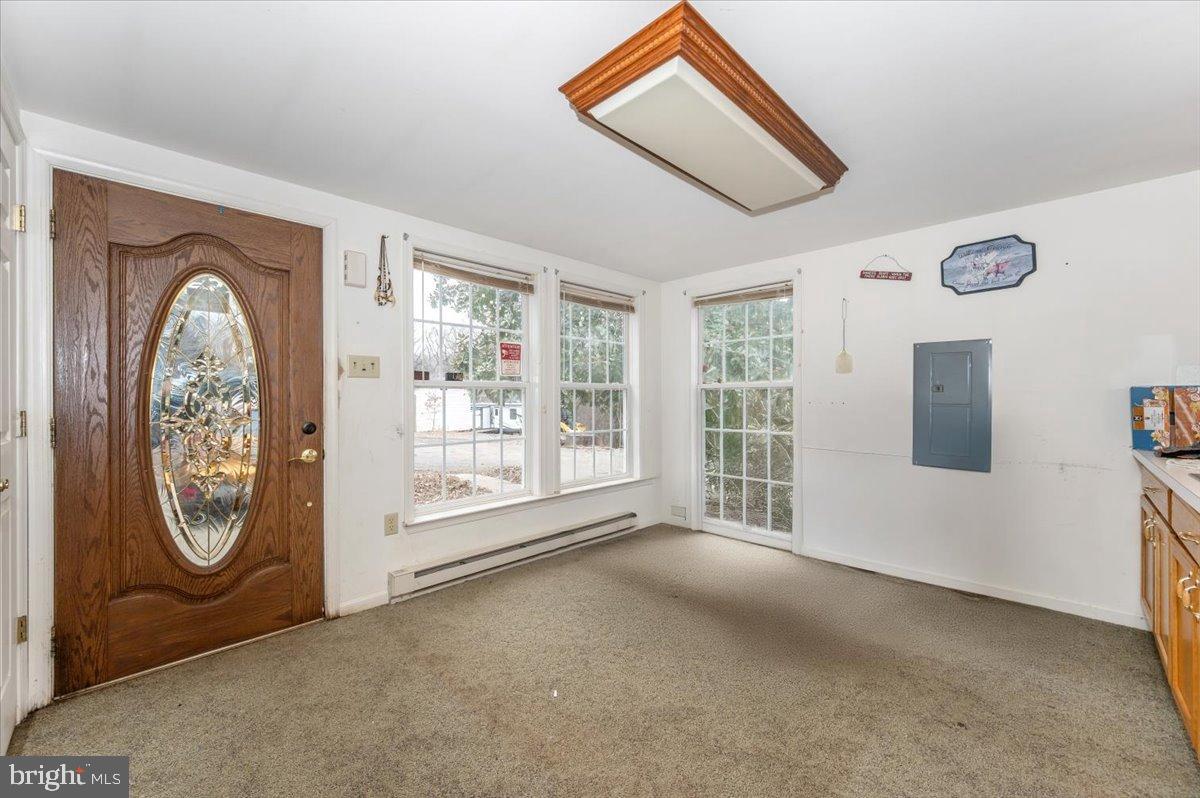 10891 Bethesda Church Road Damascus, MD 20872 - Photo 12 of 51 a view of a livingroom with furniture and windows
