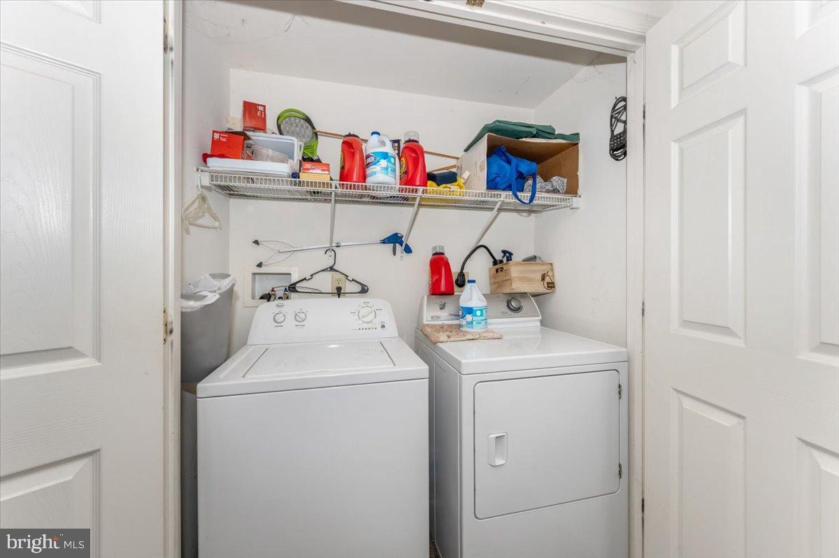 10891 Bethesda Church Road Damascus, MD 20872 - Photo 13 of 51 a utility room with dryer and washer