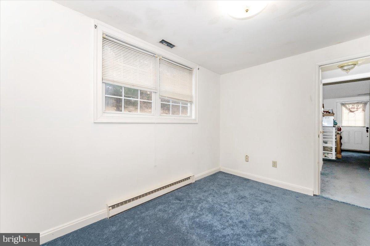 10891 Bethesda Church Road Damascus, MD 20872 - Photo 19 of 51 an empty room with a window