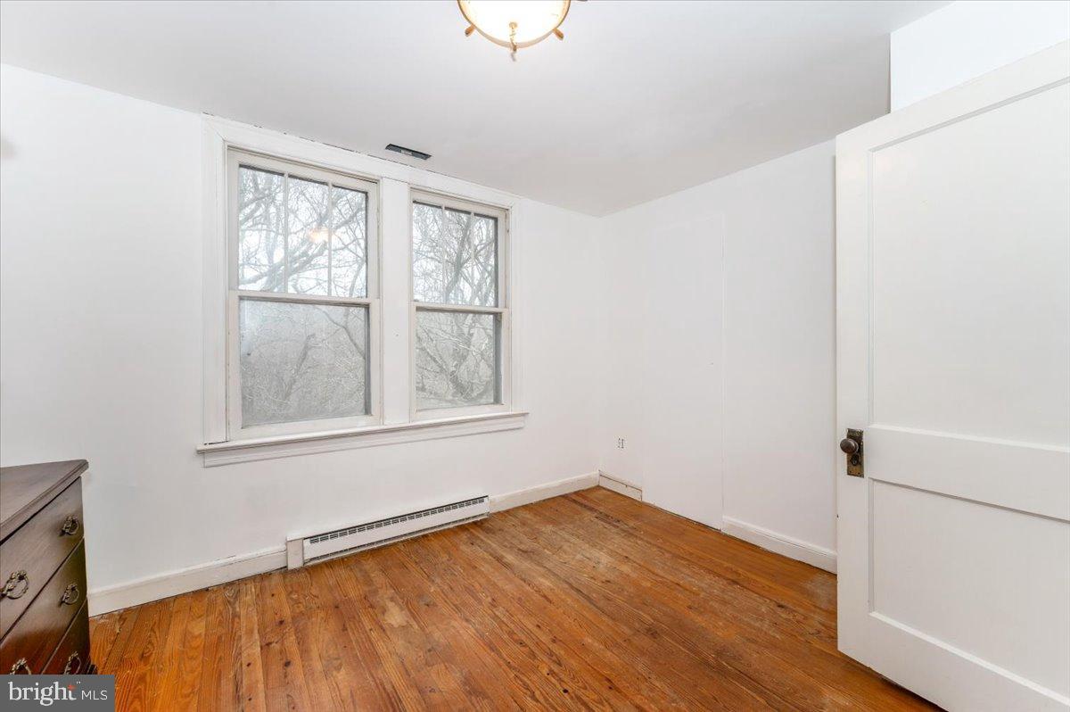 10891 Bethesda Church Road Damascus, MD 20872 - Photo 22 of 51 an empty room with a window