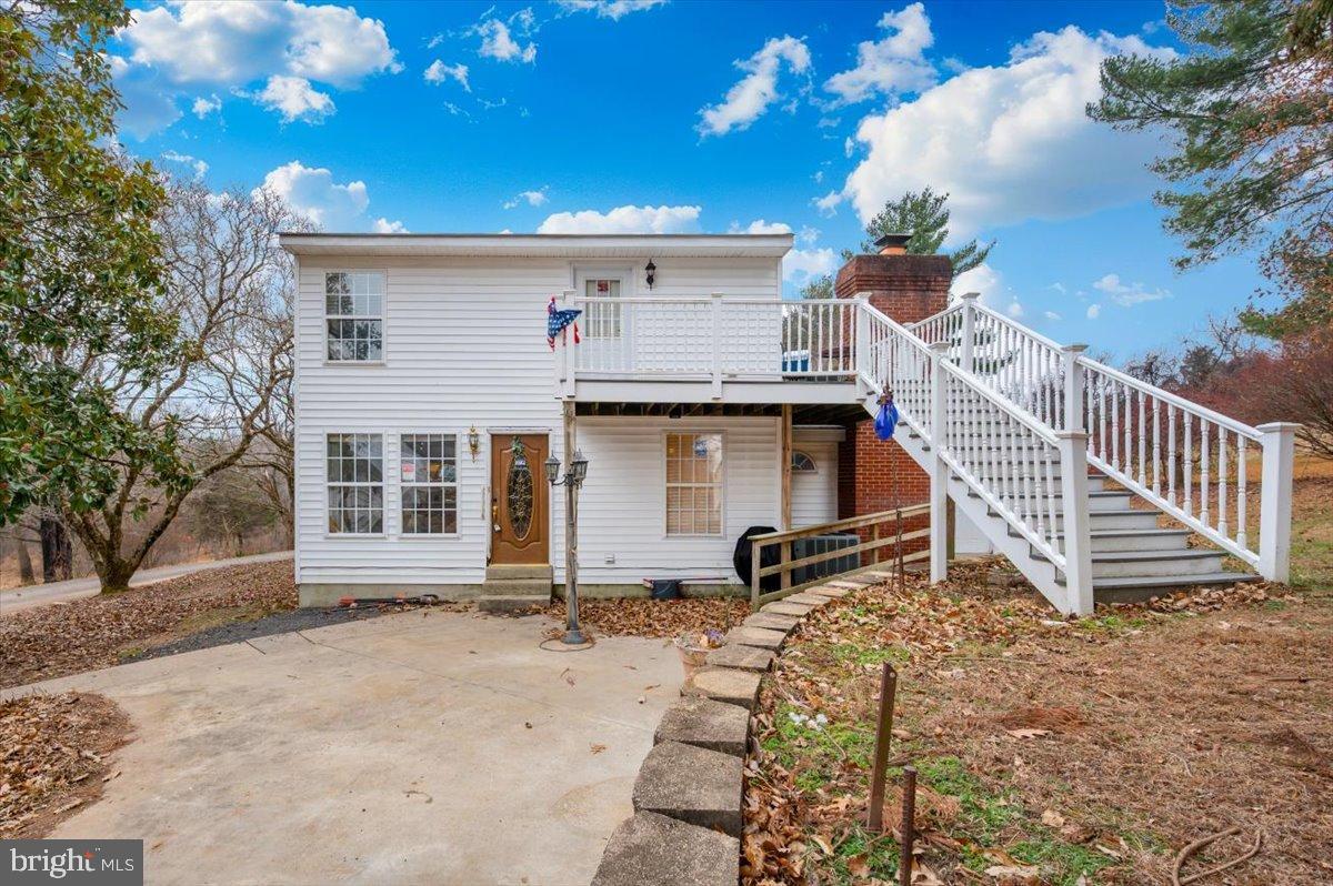 10891 Bethesda Church Road Damascus, MD 20872 - Photo 26 of 51 a view of a house with a yard