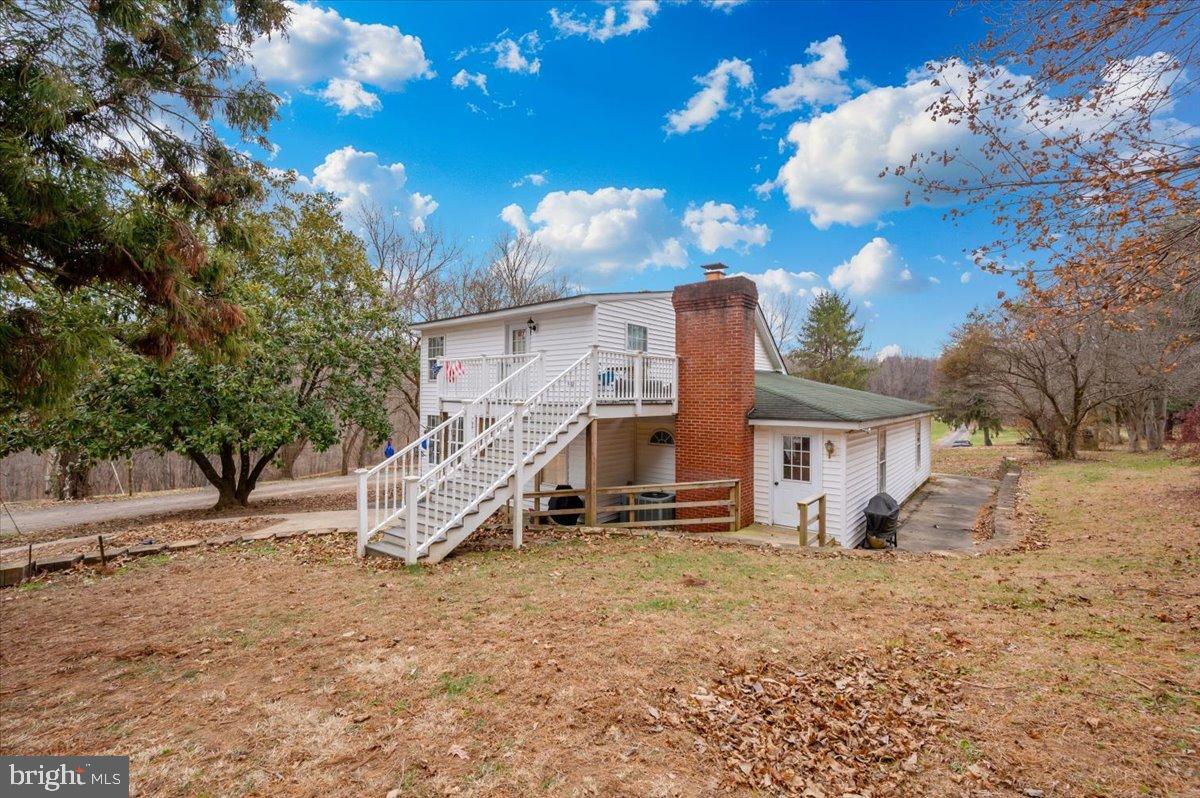 10891 Bethesda Church Road Damascus, MD 20872 - Photo 27 of 51 a view of a house with a yard