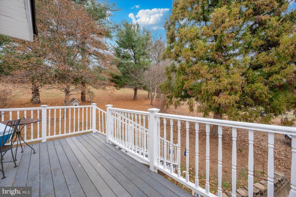10891 Bethesda Church Road Damascus, MD 20872 - Photo 28 of 51 a view of balcony with wooden floor