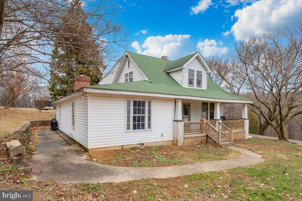 10891 Bethesda Church Road Damascus, MD 20872 - Photo 34 of 51 a view of a house with a yard