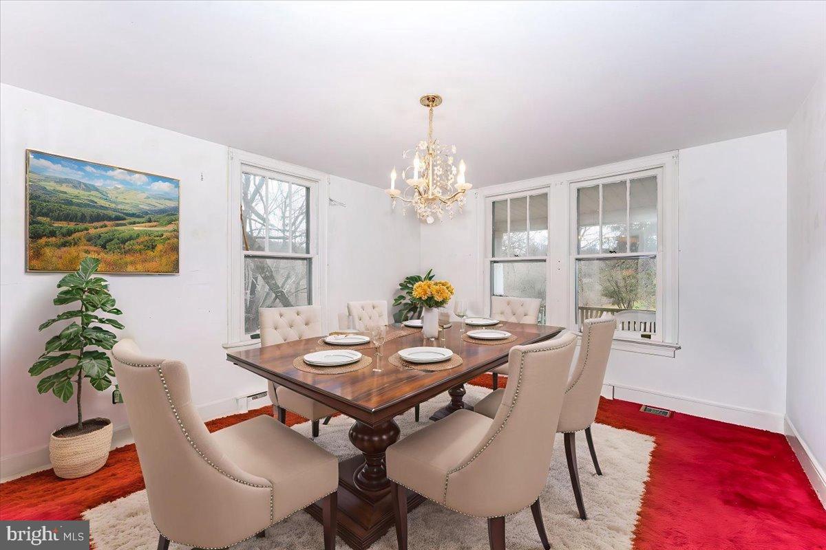 10891 Bethesda Church Road Damascus, MD 20872 - Photo 5 of 51 a view of a dining room with furniture window and wooden floor