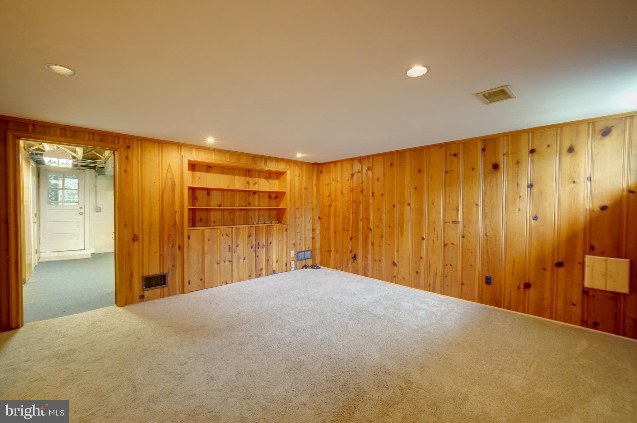 226 Stanmore Road Baltimore, MD 21212 - Photo 21 of 30 Large club room with knotty pine