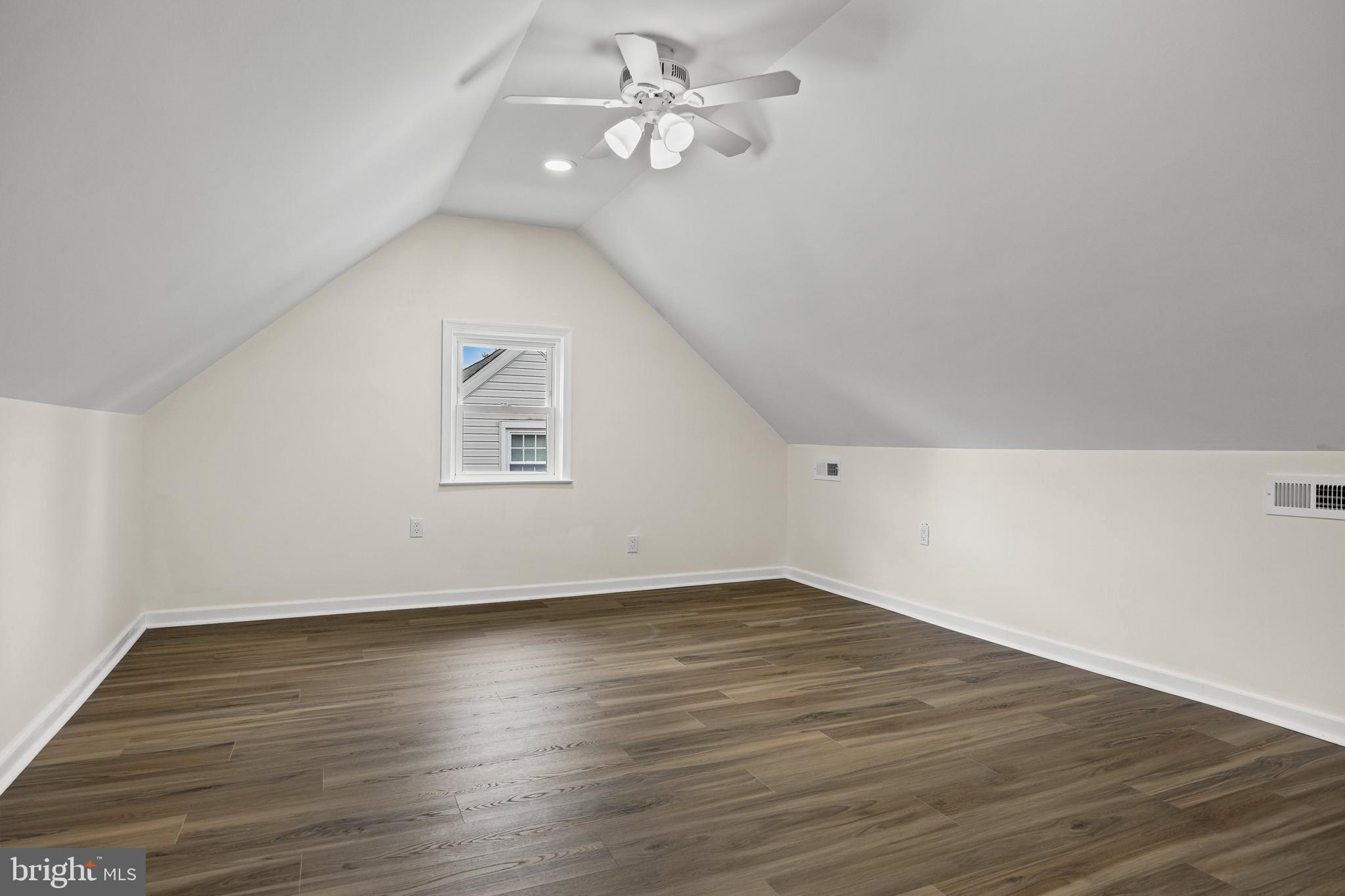 937 Clements Bridge Road Barrington, NJ 08007 - Photo 28 of 34 a view of an empty room with wooden floor and a ceiling fan