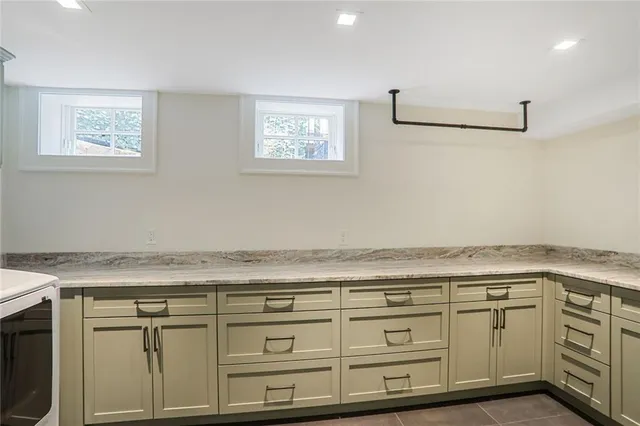 a view of cabinets with wooden floor