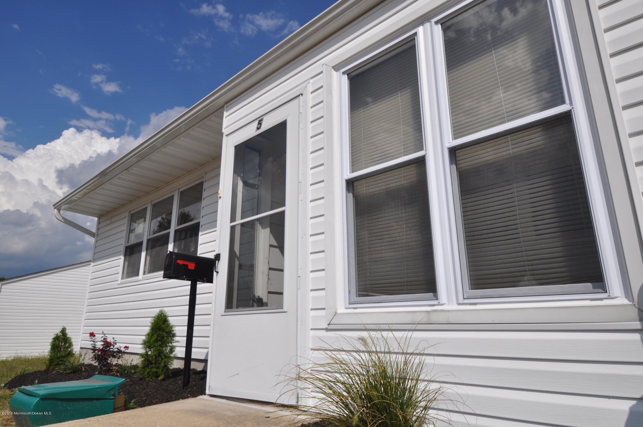 5 Valery Road, Unit 755 Matawan, NJ 07747 - Photo 1 of 1 a view of a house with a window