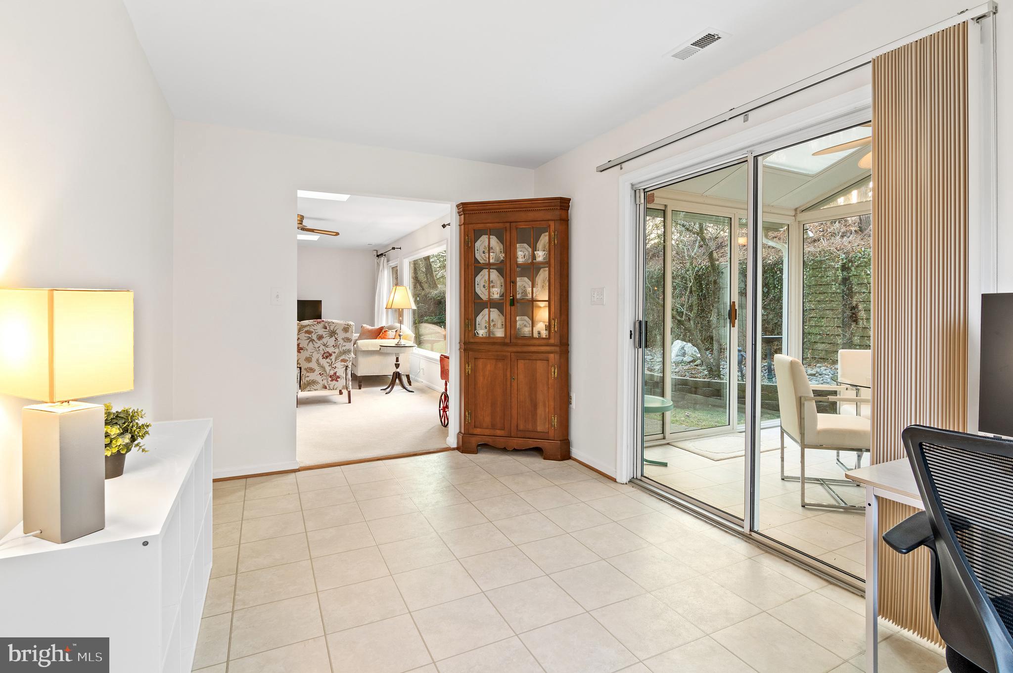 878 Rudder Way Annapolis, MD 21401 - Photo 17 of 35 Den leads to the Sunroom addition