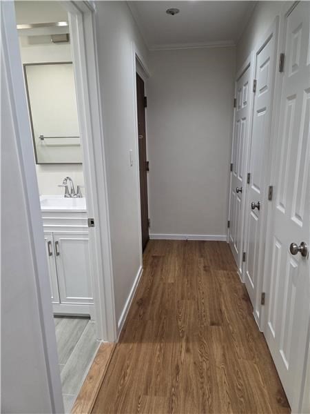 1000 Lexington Street, Unit 36 Waltham, MA 02451 - Photo 5 of 10 a view of a room with wooden floor and staircase