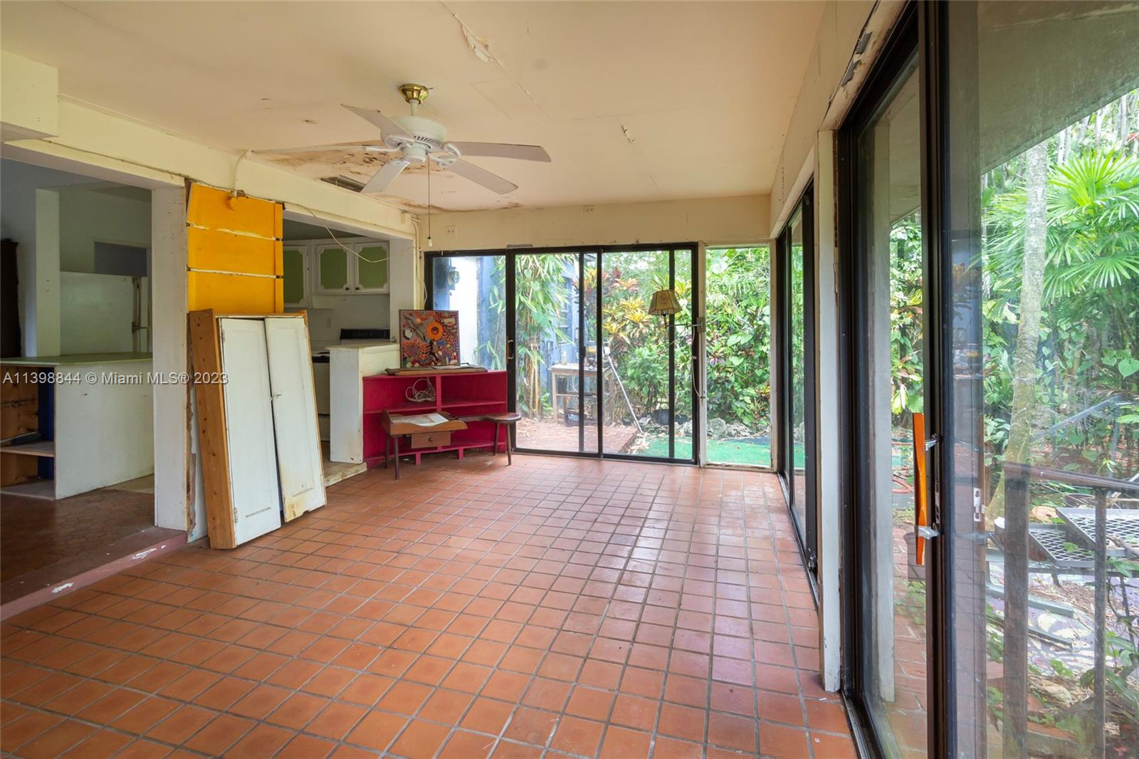 6600 Southwest 45th Street Miami, FL 33155 - Photo 13 of 27 a living room with furniture and a large window