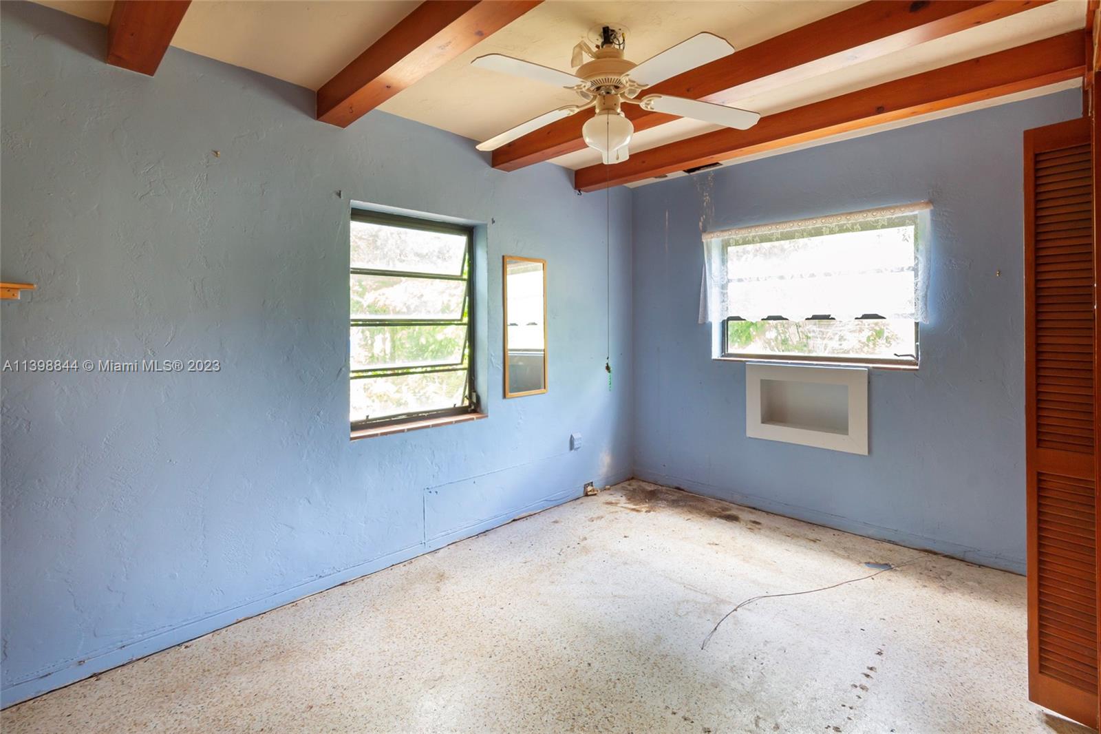 6600 Southwest 45th Street Miami, FL 33155 - Photo 18 of 27 an empty room with windows