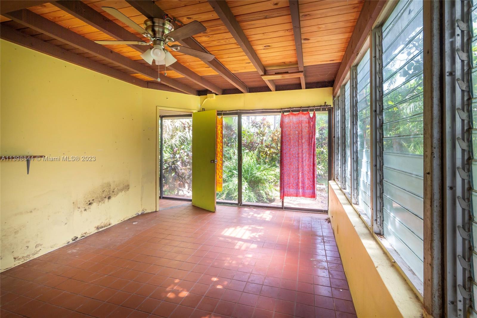 6600 Southwest 45th Street Miami, FL 33155 - Photo 25 of 27 a view of hallway with furniture and a large window