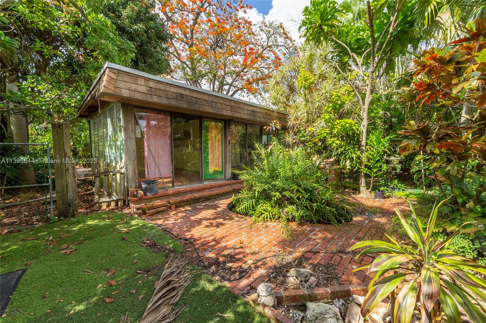 6600 Southwest 45th Street Miami, FL 33155 - Photo 26 of 27 a view of a house with a small yard