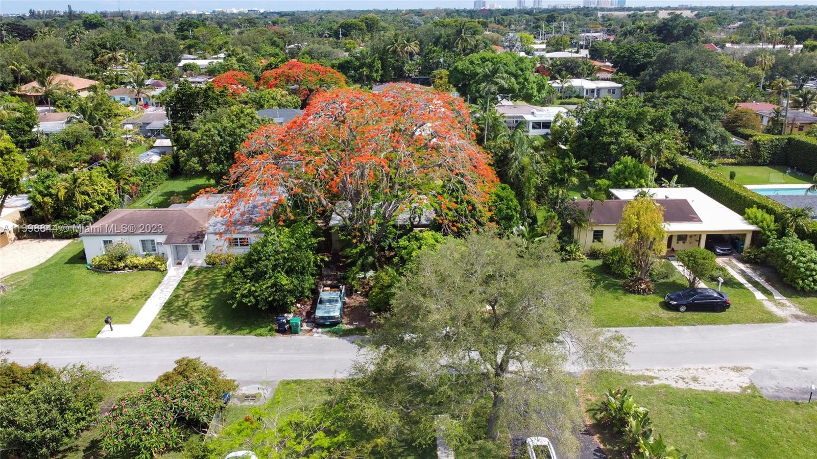 6600 Southwest 45th Street Miami, FL 33155 - Photo 4 of 27 an aerial view of residential houses with outdoor space and trees all around
