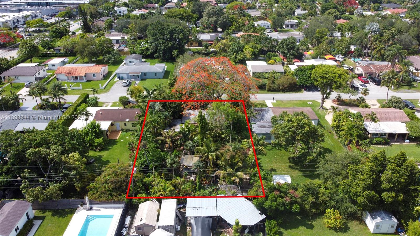 6600 Southwest 45th Street Miami, FL 33155 - Photo 5 of 27 an aerial view of residential houses with outdoor space and trees all around
