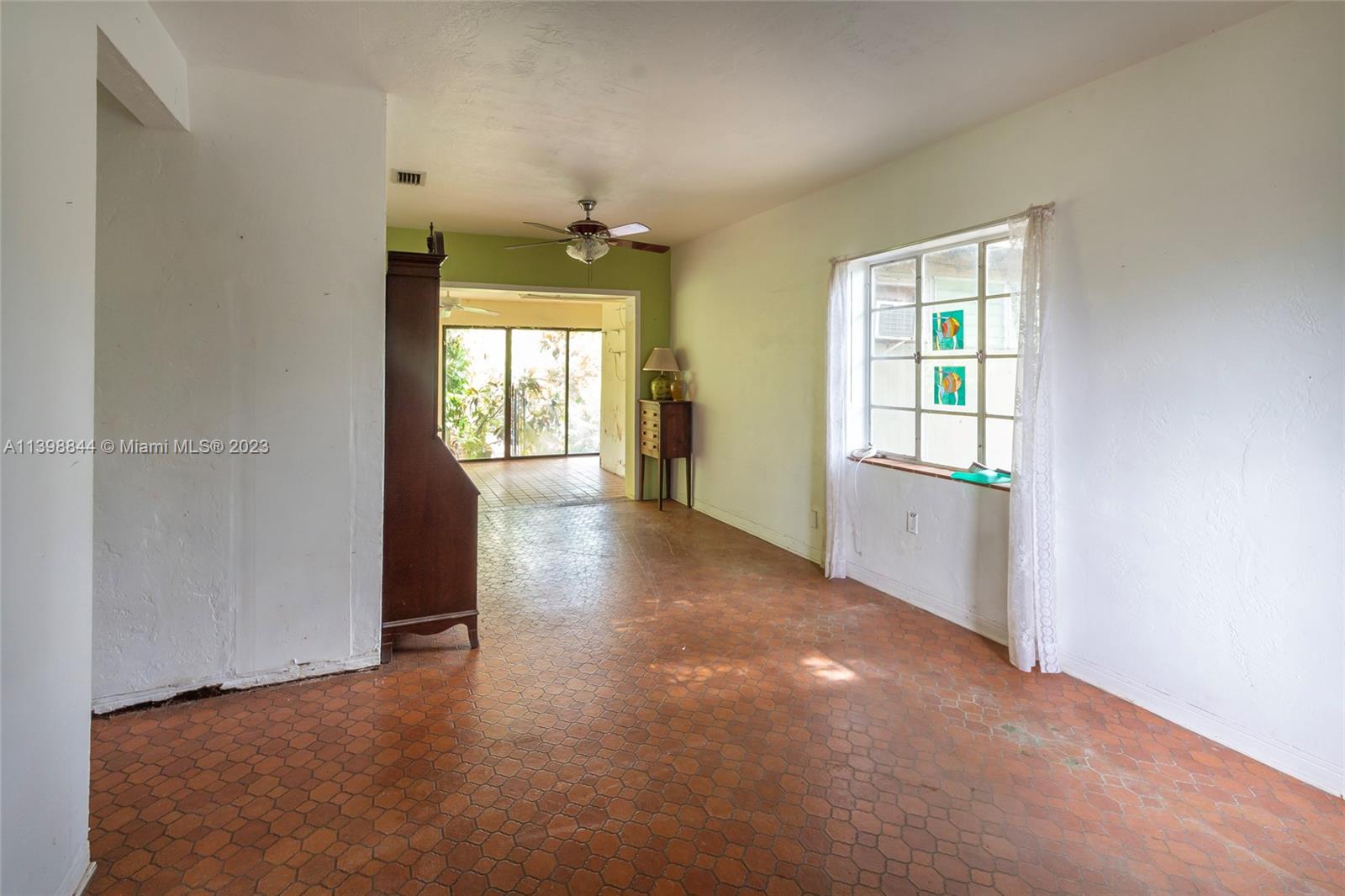 6600 Southwest 45th Street Miami, FL 33155 - Photo 10 of 27 an empty room with windows and entrance