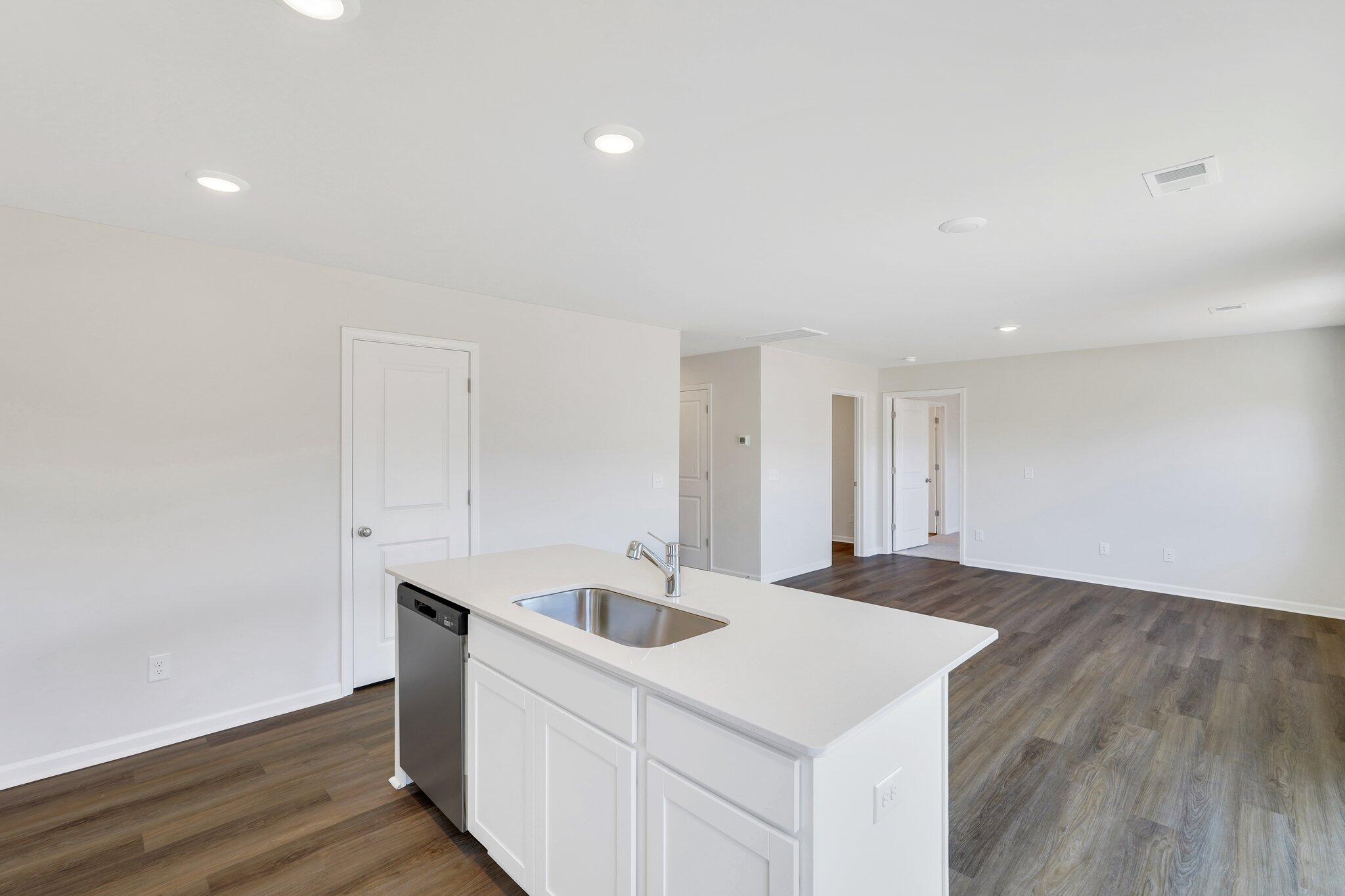 7031 Windham Way Ladson, SC 29456 - Photo 4 of 57 Sprawling Quartz Kitchen Island