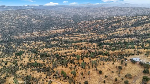 an aerial view of residential house and space