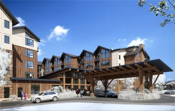 a view of a city with tall buildings