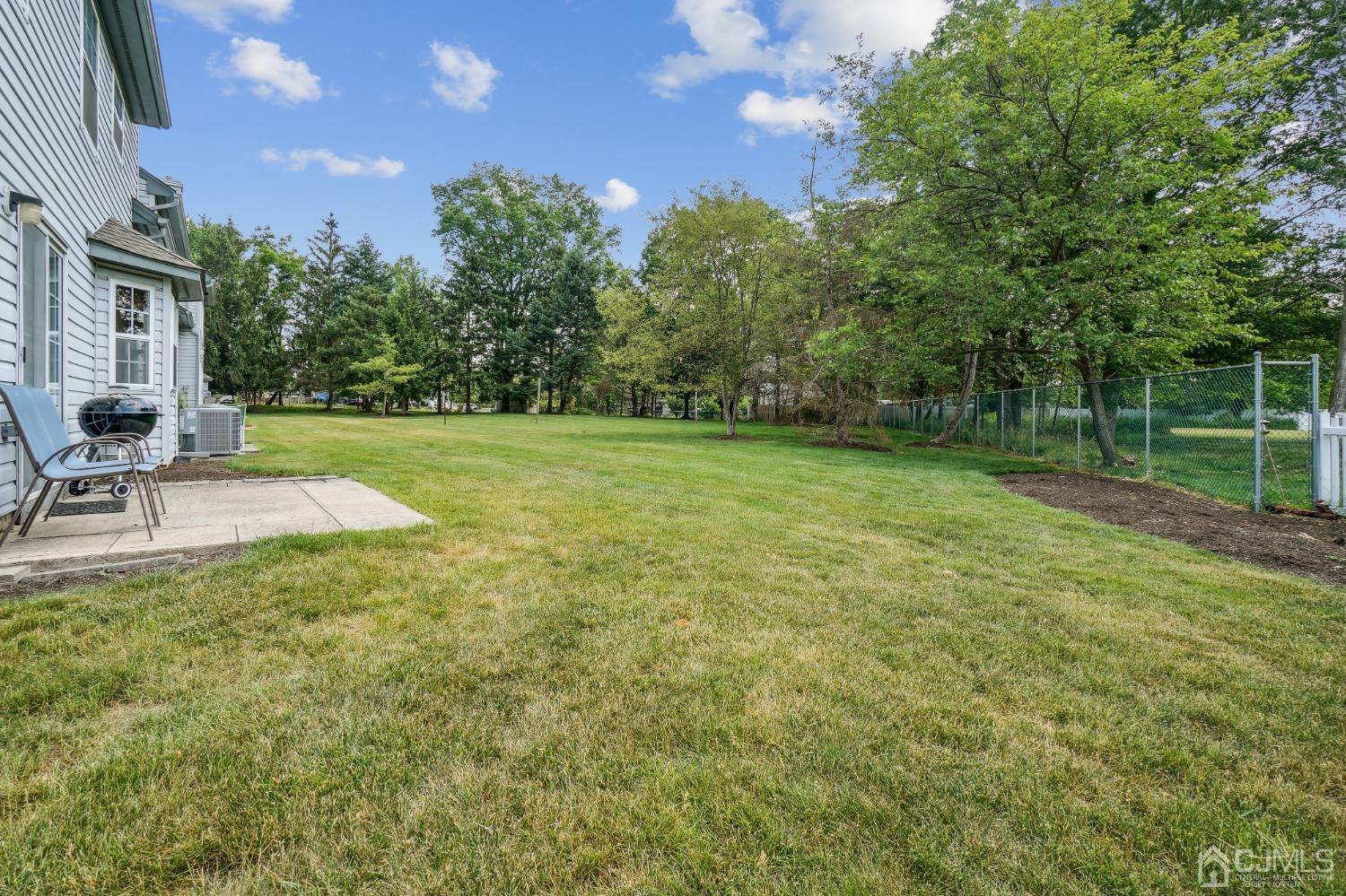 138 Nebula Road Piscataway, NJ 08854 - Photo 14 of 17 a view of a backyard with a garden