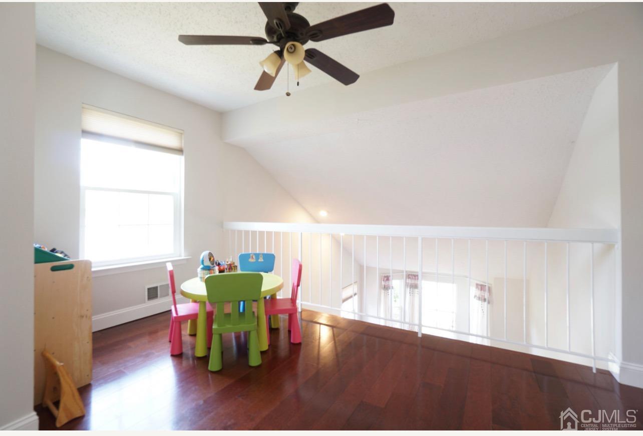 138 Nebula Road Piscataway, NJ 08854 - Photo 10 of 17 a view of a dining room with furniture and a window