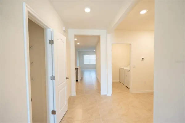a view of a bathroom with a shower and a sink