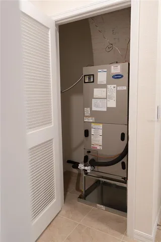 a room with two chairs and a table