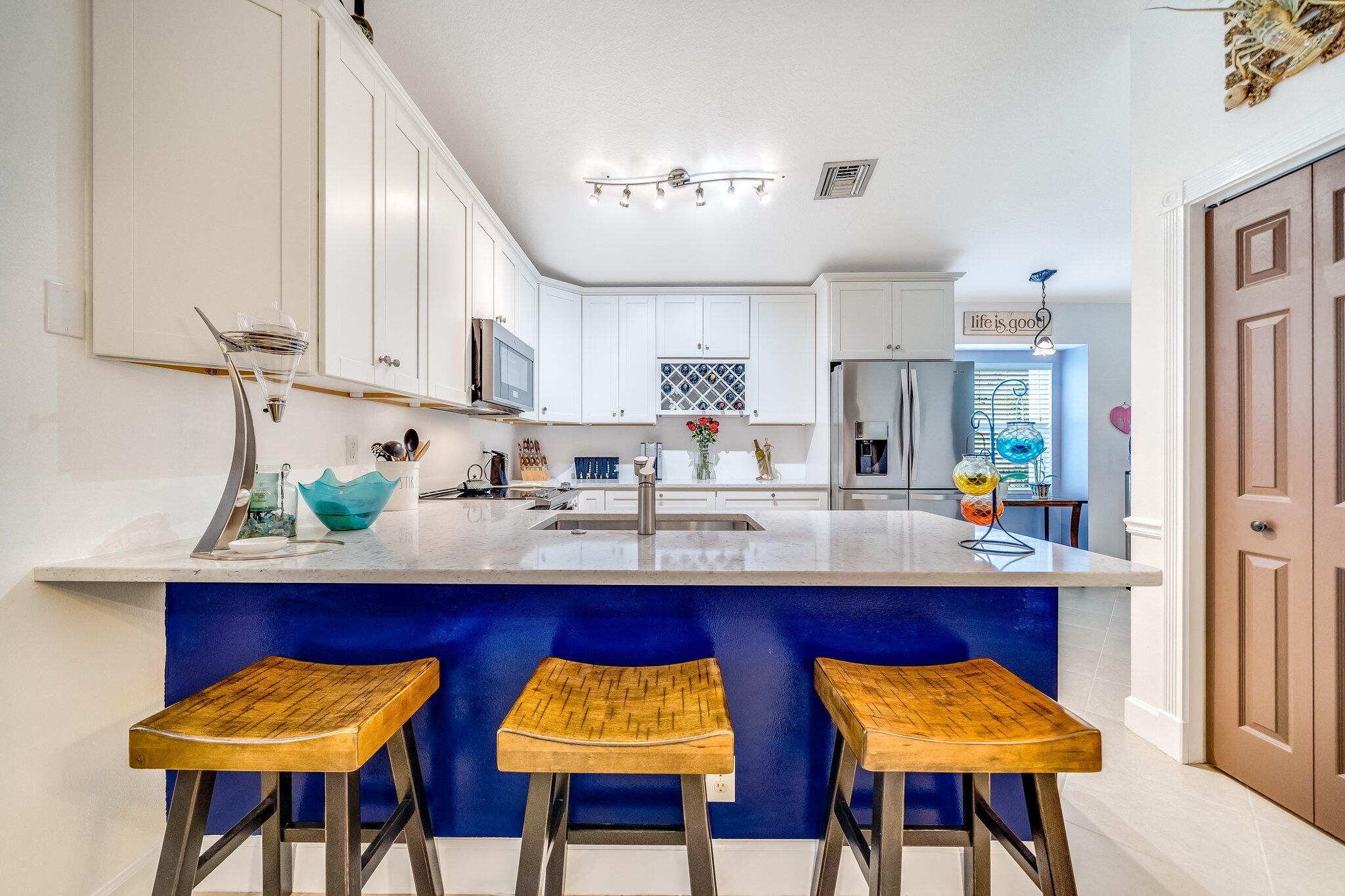 2511 Southwest Regency Road Stuart, FL 34997 - Photo 27 of 33 Kitchen Island