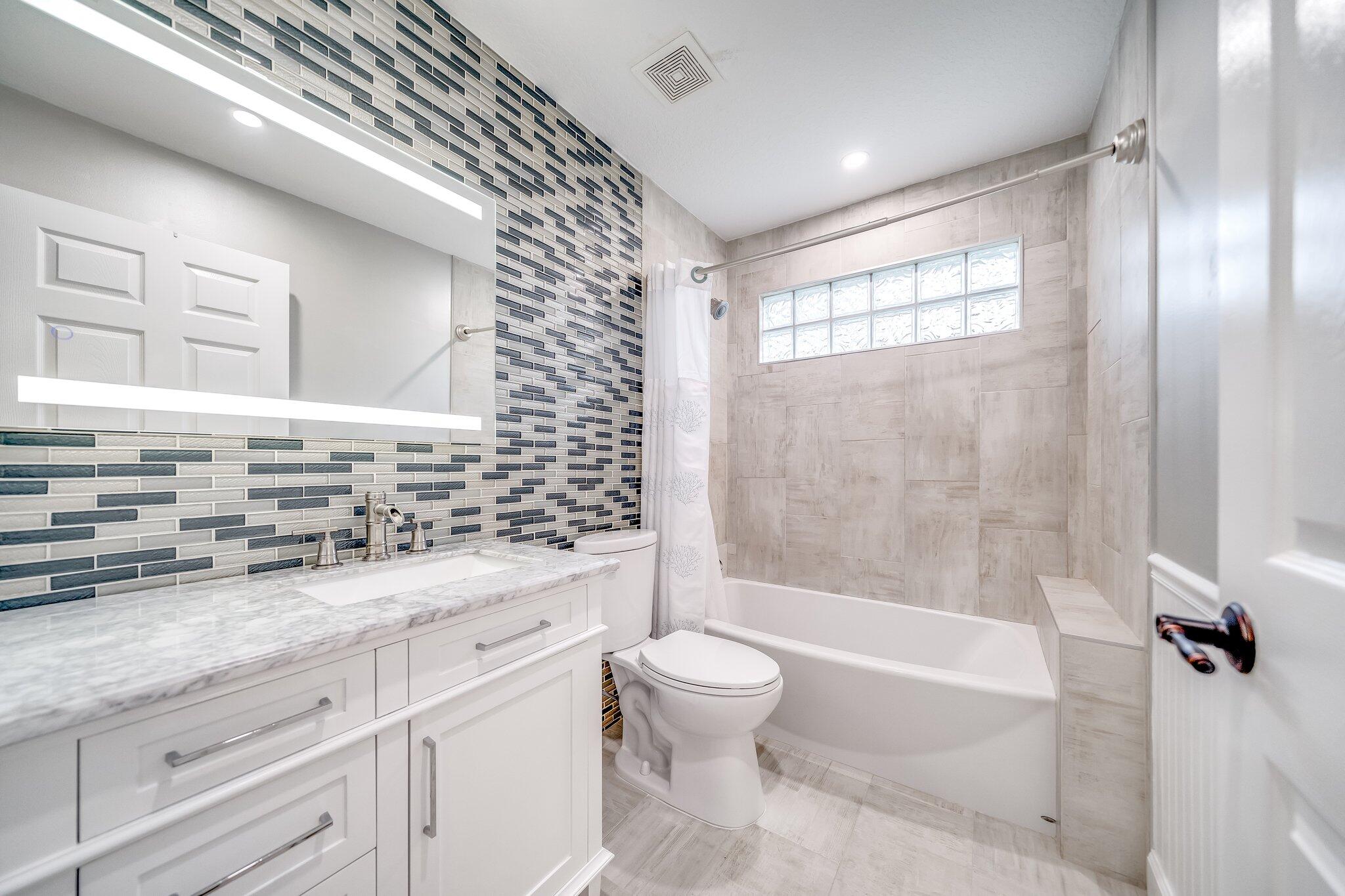 2511 Southwest Regency Road Stuart, FL 34997 - Photo 4 of 33 Guest Bathroom