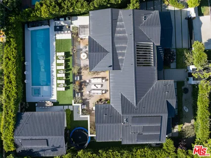 aerial view of a house with a garden