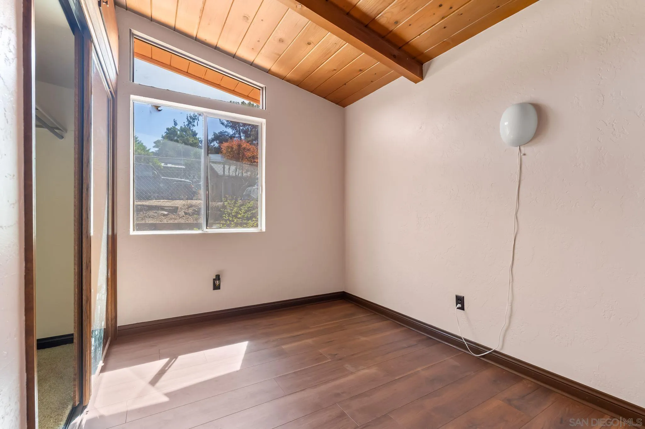 8968 Rocket Ridge Road Lakeside, CA 92040 - Photo 11 of 16 a view of an empty room with a window