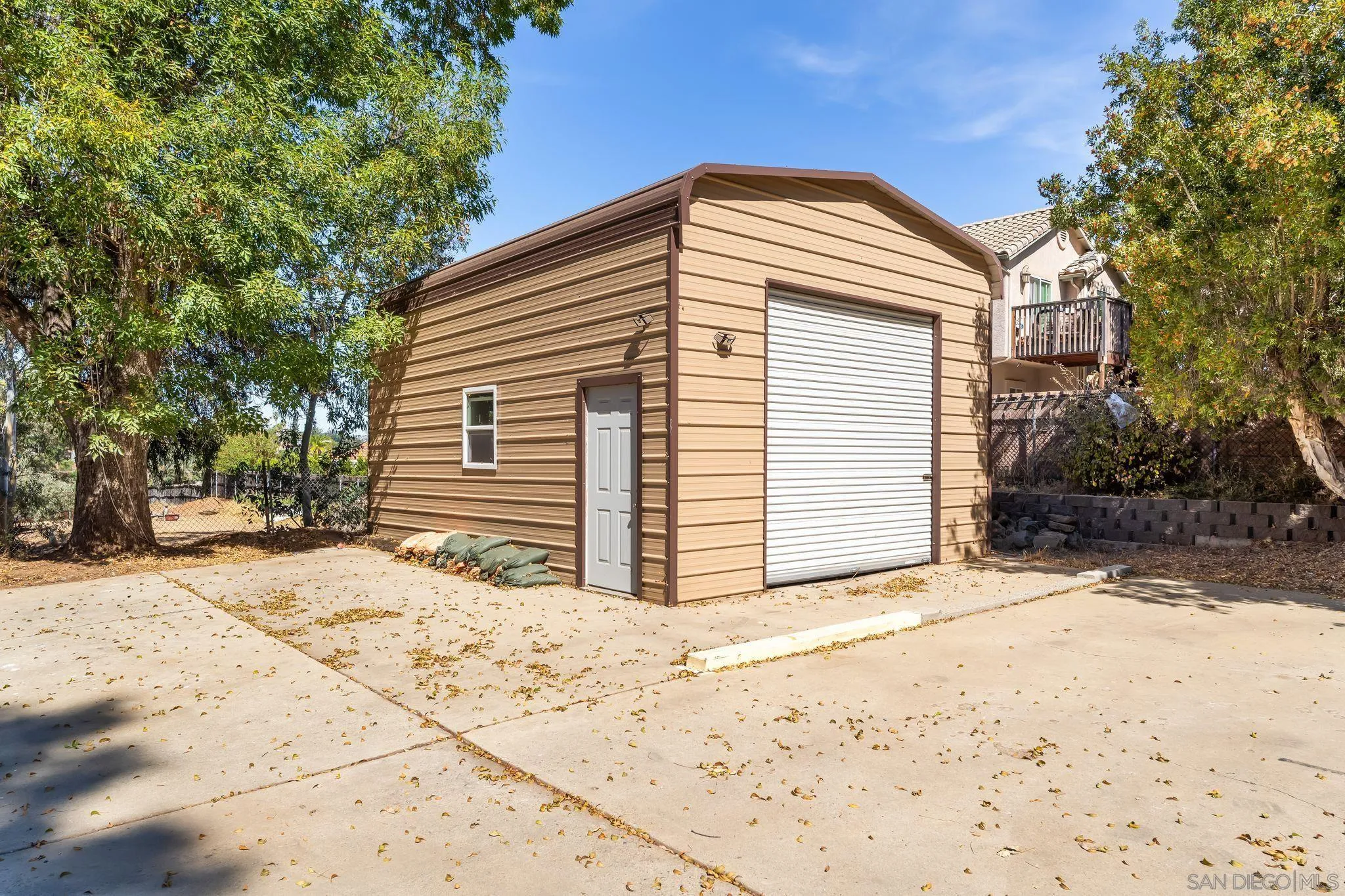 8968 Rocket Ridge Road Lakeside, CA 92040 - Photo 13 of 16 a view of a house with a yard