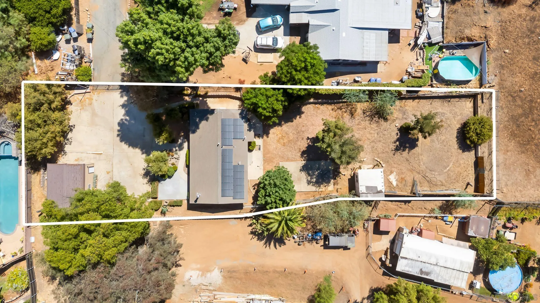 8968 Rocket Ridge Road Lakeside, CA 92040 - Photo 4 of 16 a view of a lake with a building in the background