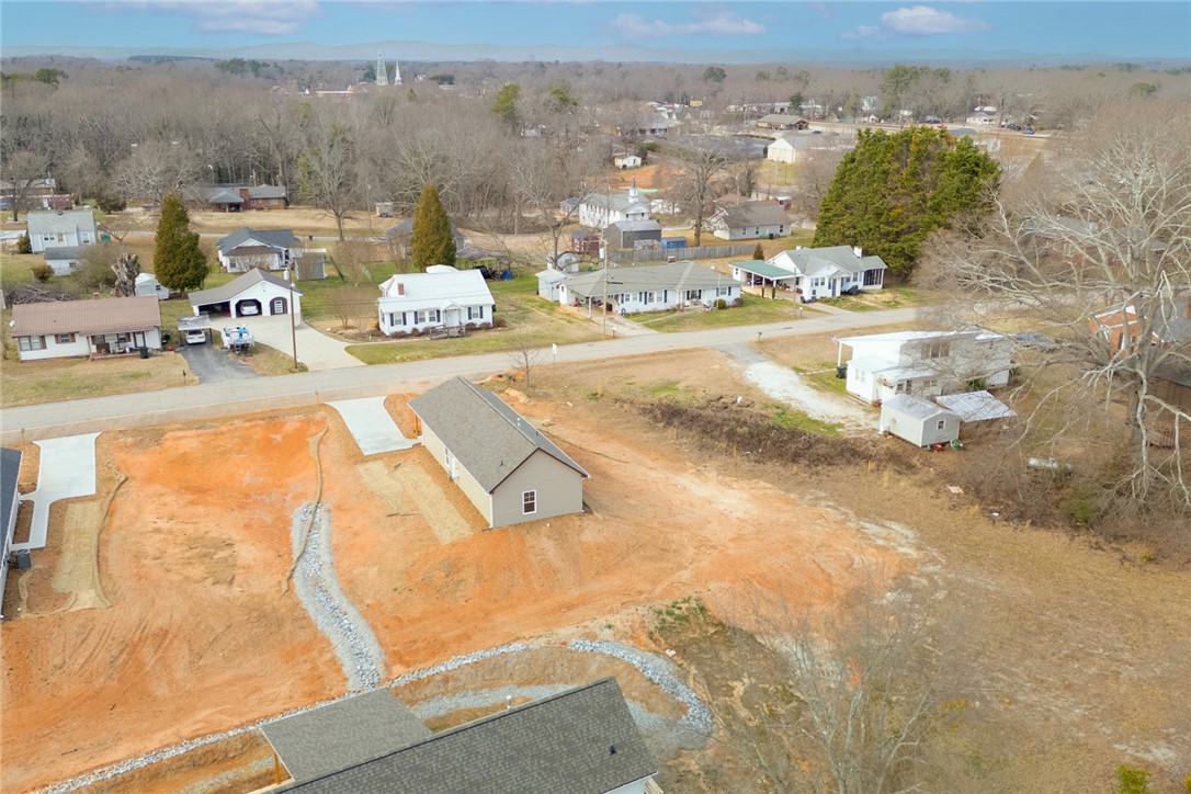 115 Riley Street Westminster, SC 29693 - Photo 31 of 46 Aerial view of a budding community with newly constructed homes and ample space for outdoor enjoyment.