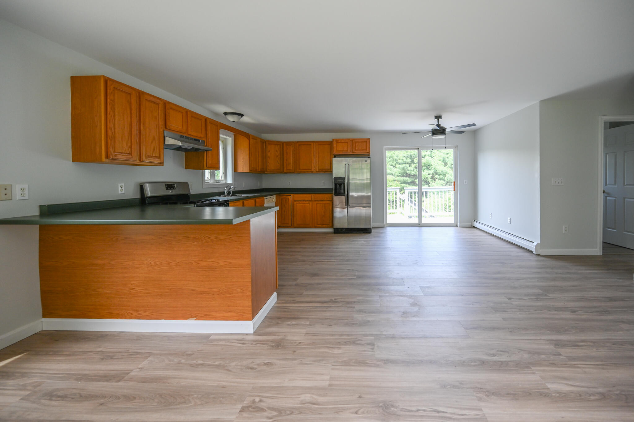 6 Garlands Way Limington, ME 04049 - Photo 10 of 46 Open kitchen, dining, living space
