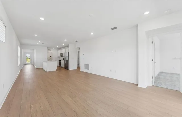 an empty room with windows