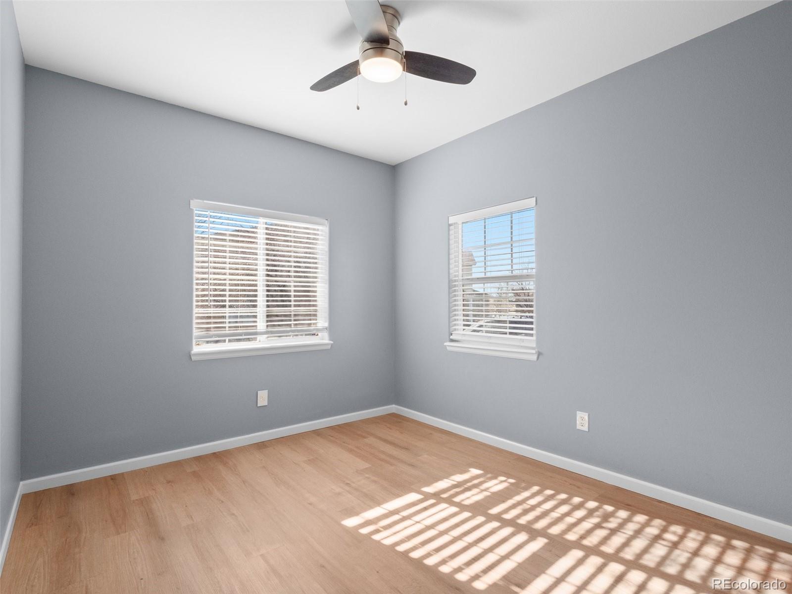 5335 Pecos Way, Unit 4 Denver, CO 80221 - Photo 14 of 25 a view of an empty room with a window