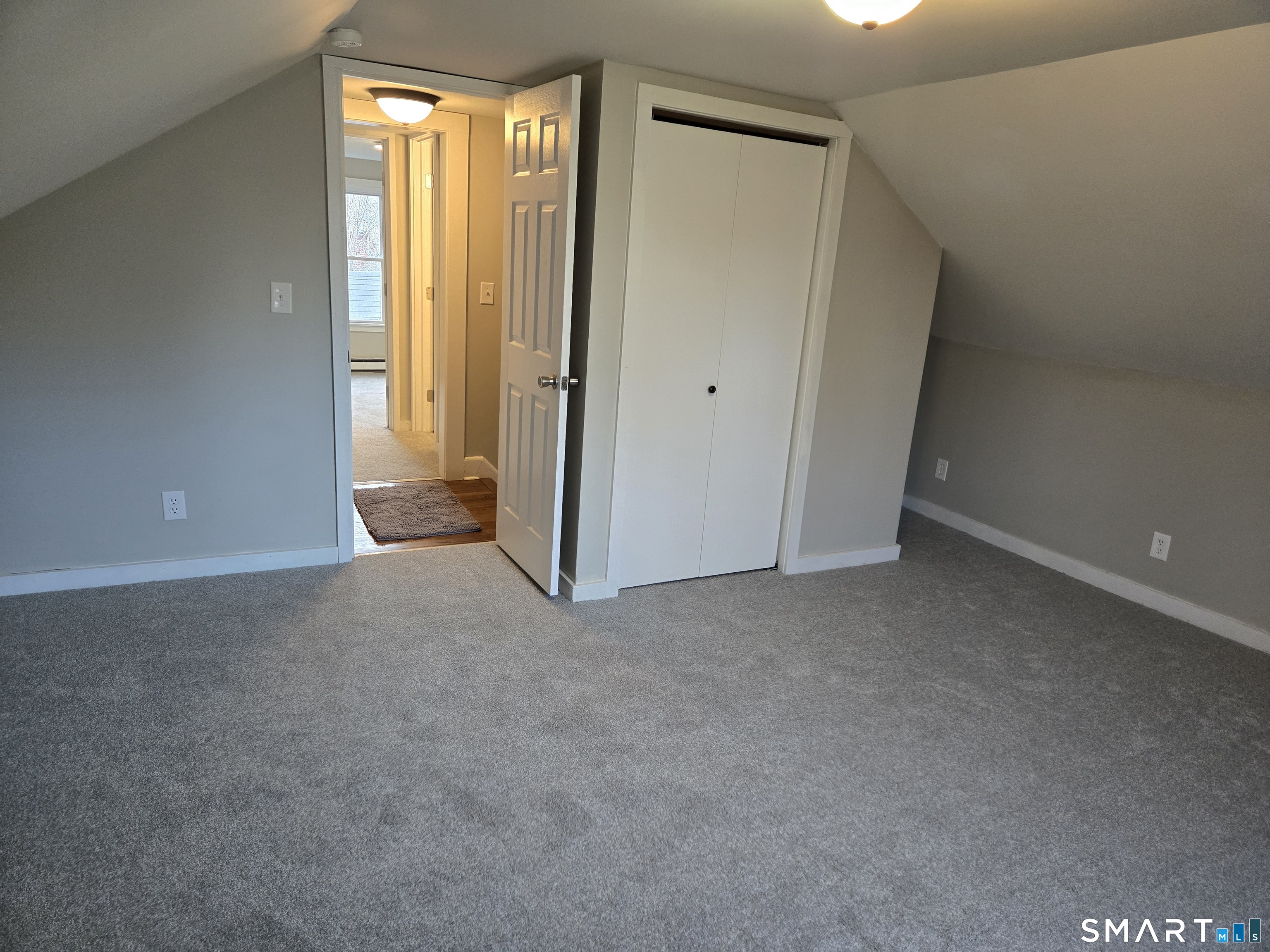 242 Elm Street Enfield, CT 06082 - Photo 15 of 21 an empty room with windows
