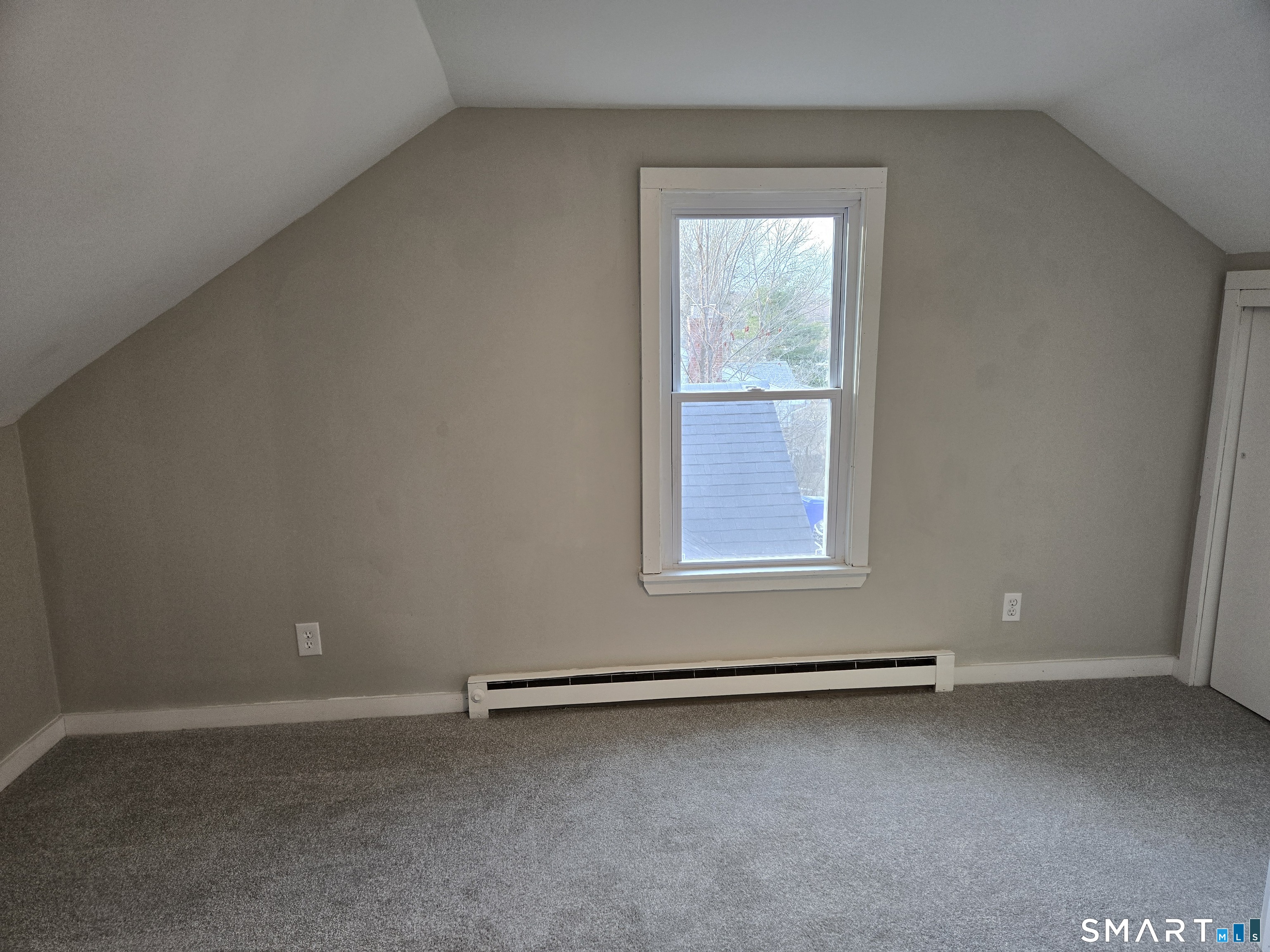 242 Elm Street Enfield, CT 06082 - Photo 17 of 21 an empty room with a window