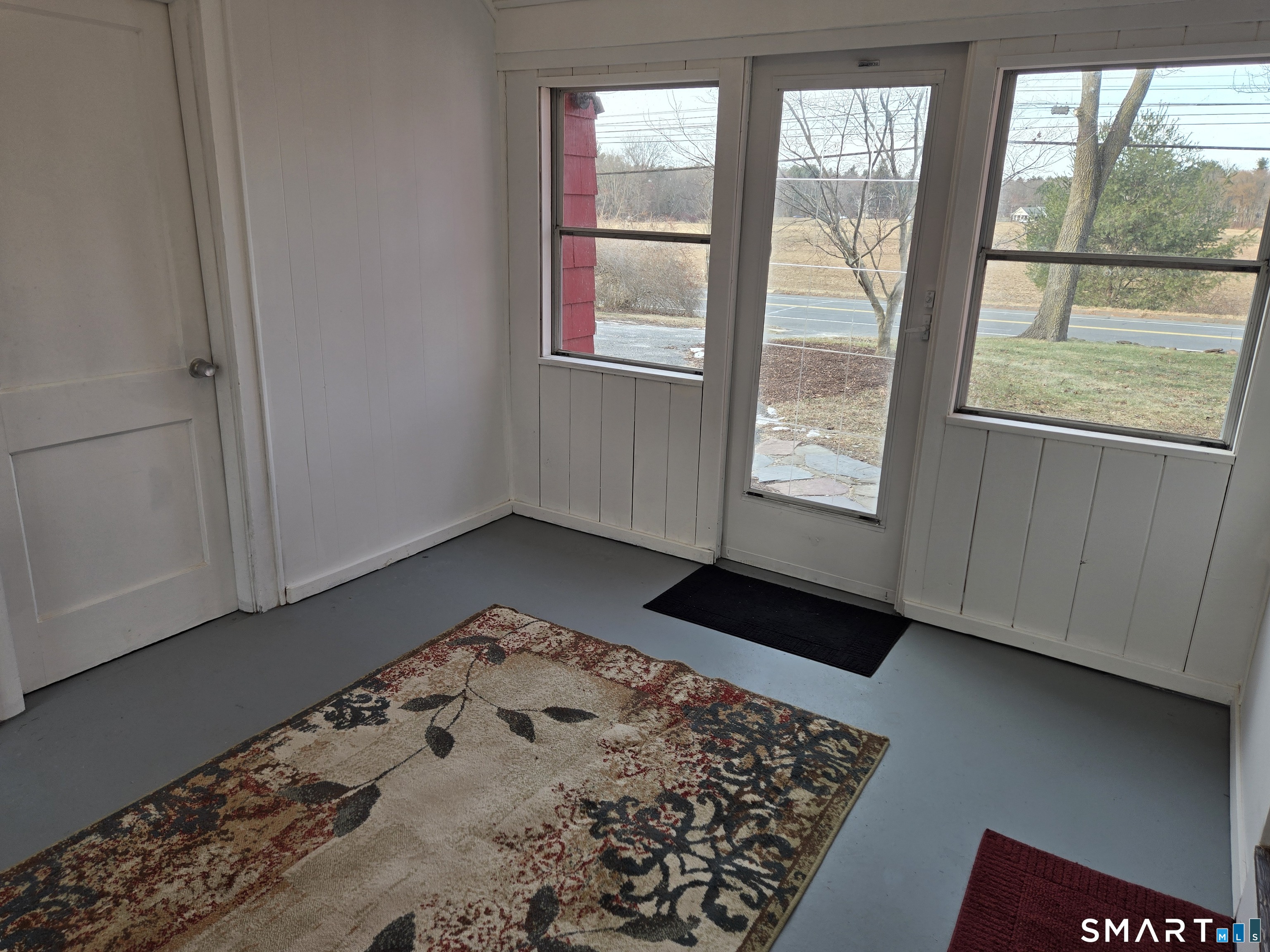 242 Elm Street Enfield, CT 06082 - Photo 21 of 21 an empty room with windows