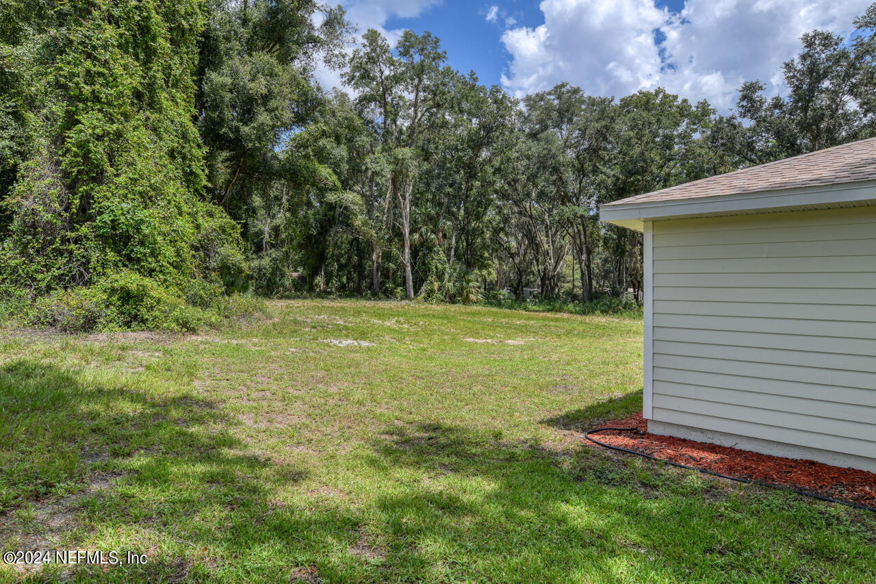 101 Killian Drive Hawthorne, FL 32640 - Photo 4 of 34 SIDE & REAR OF HOME