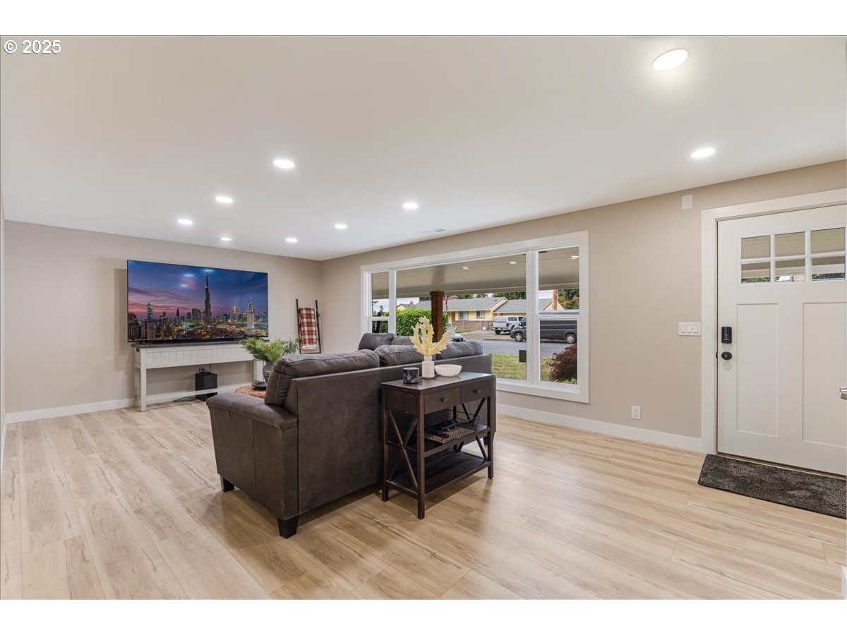 1317 Filbert Street Forest Grove, OR 97116 - Photo 5 of 29 a living room with furniture and a wooden floor