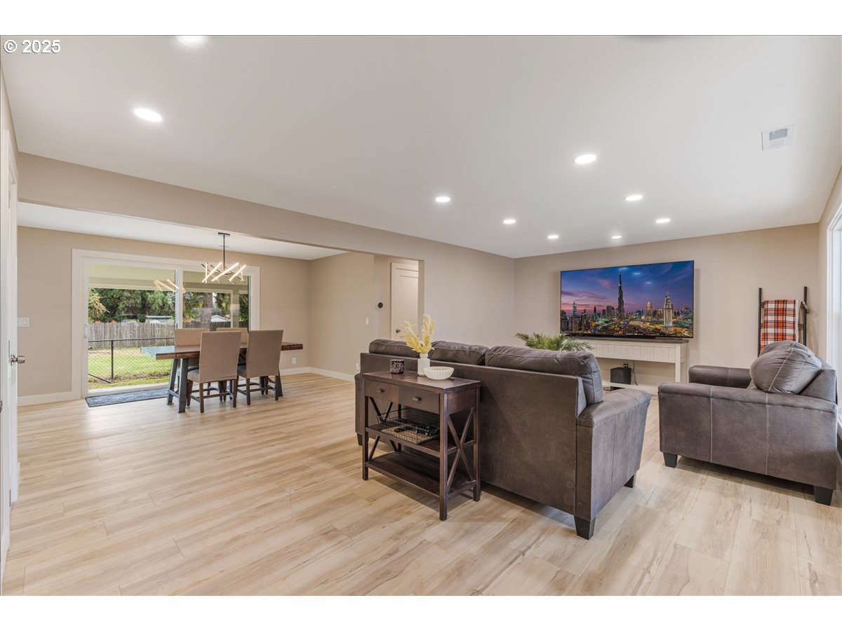 1317 Filbert Street Forest Grove, OR 97116 - Photo 6 of 29 a living room with lots of furniture and kitchen view