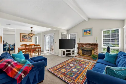 a bed room with a bed and a television