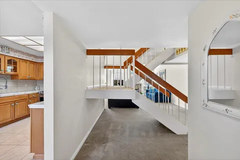 a dining room with table and chairs